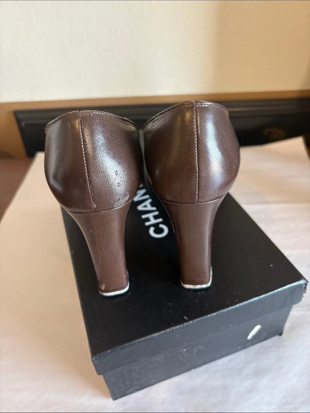 CHANEL Two-Tone Brown and Black Leather Cap-Toe Pumps
